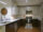 Apartment kitchen furnished with stainless steel